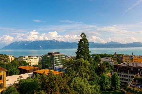 Cityscape and Lake Geneva with Mountain View in a Sunny Summer Day in Lausanne, Vaud, Switzerland