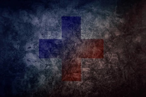 Swiss Flag with Cross and with Red and Blue Colors on an Old Background in Switzerland