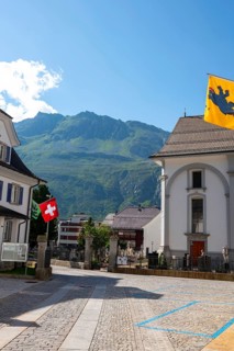 Beautiful Catholic Parish Church of St Peter and Paul in Old Town with Mountain and Blue Sky in a