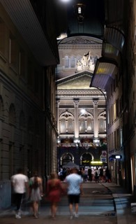 Beautiful Bundeshaus Illuminated Parliament Building or Federal Palace and a Street with People at