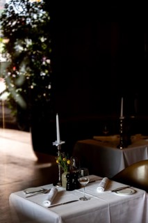Beautiful Romantic Restaurant with Window Reflection and Table and Chair in City of Bern, Canton