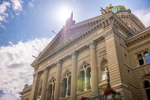 Beautiful Bundeshaus Parliament Building or Federal Palace in a Sunny Day with Sunlight and Lens
