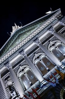 Beautiful Bundeshaus Illuminated Parliament Building or Federal Palace with Statue at Night in City