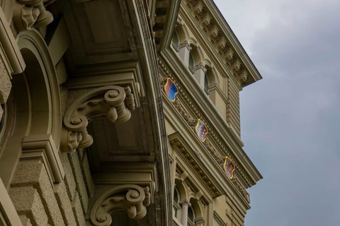 Beautiful Bundeshaus Parliament Building or Federal Palace with Canton Shield and Storm Clouds in