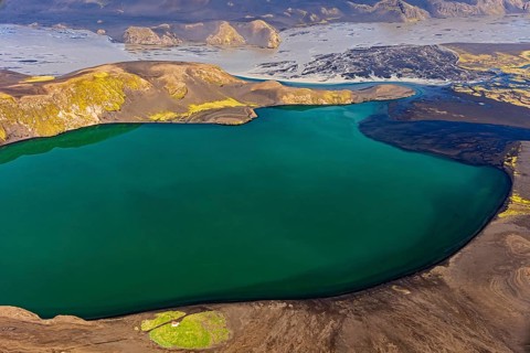 Mountain landscape, river, river delta, river course, lake, volcanic landscape, sunny, aerial view,
