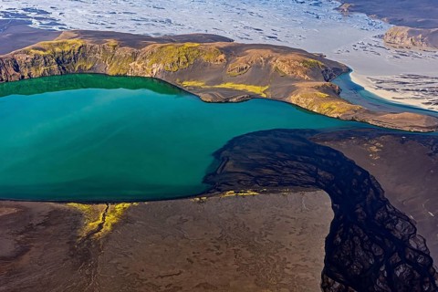 Mountain landscape, river, river delta, river course, lake, volcanic landscape, sunny, aerial view,