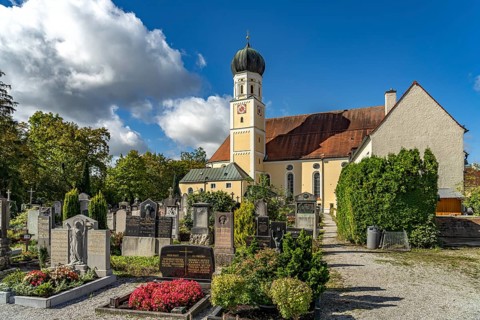 The parish church of St Magdalena and cemetery in Fürstenfeldbruck, Bavaria, Germany