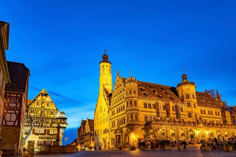 Town hall and town hall tower in Rothenburg ob der Tauber at dusk, Bavaria, Germany