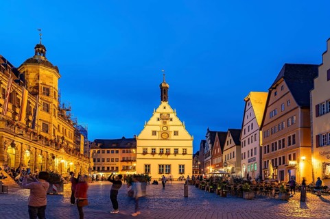 Market square, town hall and council drinking parlour in Rothenburg ob der Tauber at dusk, Bavaria,