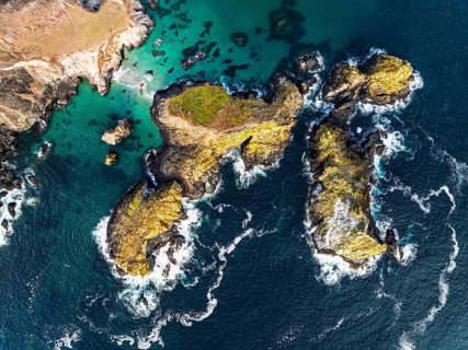 Top Down view over Kynance Cove from a drone, Mount's Bay, Lizard Point, Cornwall, England, United