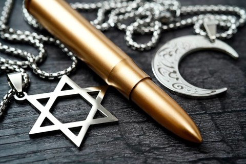 Rifle cartridge between chains with Star of David and crescent, symbolic photo Middle East and Gaza