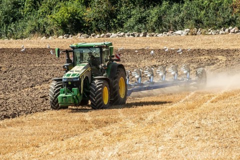 Autumn plowing with tractor in Borrie, Ystad municipality, Skåne county, Sweden, Scandinavia