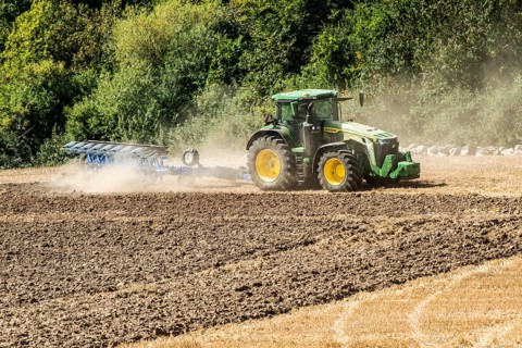 Autumn plowing with tractor in Borrie, Ystad municipality, Skåne county, Sweden, Scandinavia