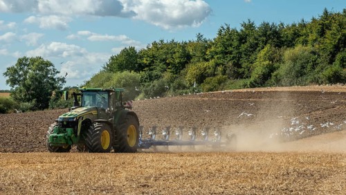 Autumn plowing with tractor in Borrie, Ystad municipality, Skåne county, Sweden, Scandinavia