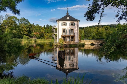 The Trappenseeschlösschen in the Trappensee in Heilbronn, Baden-Württemberg, Germany