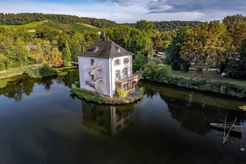 The Trappenseeschlösschen in the Trappensee in Heilbronn seen from the air, Baden-Württemberg,