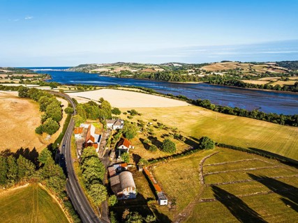 Farms and Fields over River Teign and Teignmouth Road from drone, Newton Abbot, Devon, England,