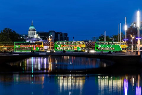 Buses on a bridge over the River Liffey, blue hour, Dublin, Ireland