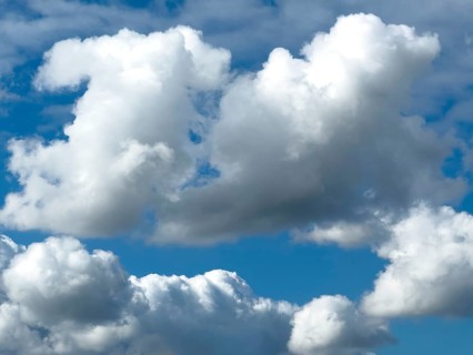 Below white clouds cumulus heap clouds above towering cumulonimbus, international