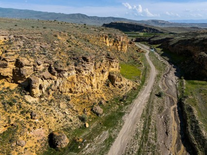 Geological formations along a dirt road in a barren landscape, aerial view, landscape at Angel's