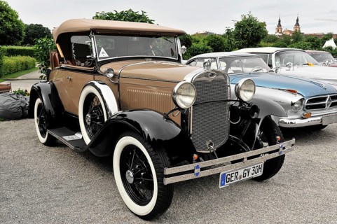 Ford A, Ford classic car, Brown-black convertible in classic style on a gravelled square, Retro