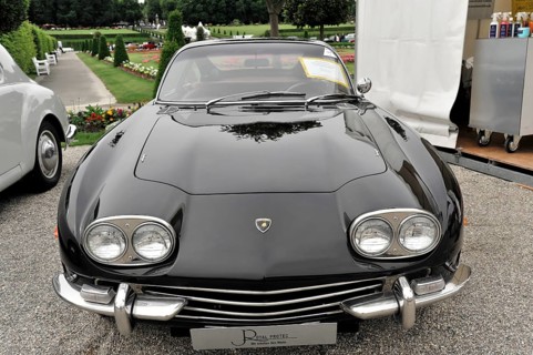 Lamborghini 400 GT, classic car, black sports car exhibited in an elegant setting, classic design,