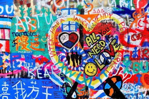 Colourful graffiti wall with heart motifs and peaceful messages, Prague, Czech Republic