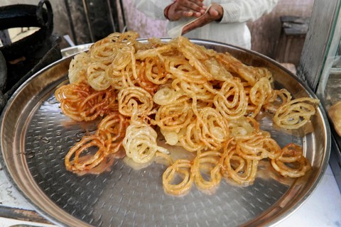 Kota, Rajasthan, North India, Asia, A tray of freshly prepared jalebis, a popular Indian sweet,