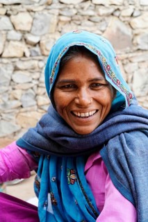 Sawai Madhopur, Kota, Rajasthan, North India, Asia, Woman in blue and pink clothes smiling with a
