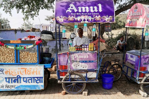 Kota, Rajasthan, North India, Asia, street stall with Amul ice cream and colourful decoration,