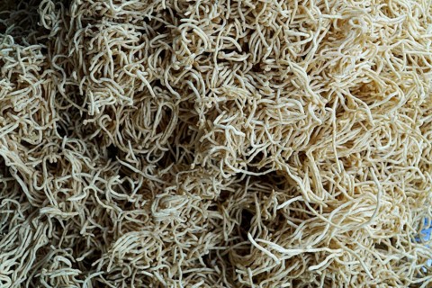 Kota, Rajasthan, North India, Asia, Pile of beige, dried noodles in a chaotic pattern, India