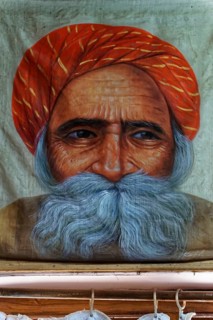 Painting, Sale, Souvenir, Udaipur, Rajasthan, India, Asia, Close-up of an elderly man with red