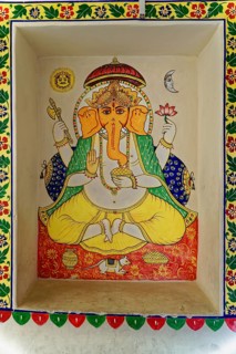 Udaipur, Rajasthan, North India, Asia, Ganesha mural in bright colours with floral details and