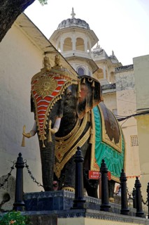 Udaipur, Rajasthan, North India, Asia, Magnificently decorated elephant statue next to an