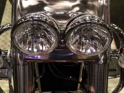 Detailed photo of the chrome headlights of a motorbike, shiny and reflective, dortmund, deutchland