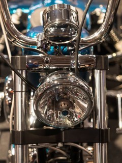 Front view of a motorbike with dominant chrome headlights, dortmund, deutchland