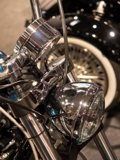 Shiny chrome headlight of a classic motorbike, dortmund, deutchland