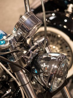 Detailed view of chrome-plated headlights of a vintage motorbike, dortmund, germany