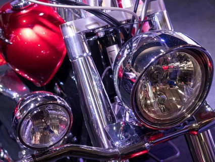 Double headlights with chrome details on a retro-style motorbike, dortmund, deutchland