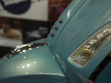 Close-up of a blue retro scooter with chrome accents and reflective surfaces, dortmund, deutchland