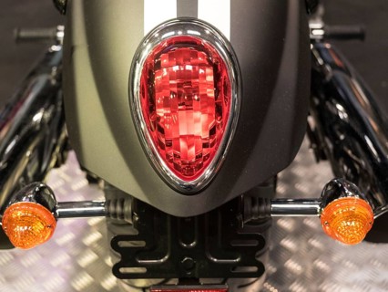 Close-up of a motorbike tail light with red and orange indicators, dortmund, deutchland