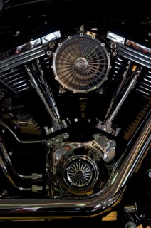 Shiny motorbike engine with shiny chrome components and central fan, dortmund, germany