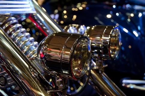Detailed view of shiny headlights on a motorbike with light-reflecting atmosphere, dortmund,