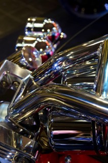 Close-up of shiny chrome parts and mechanical details of a motorbike, dortmund, germany