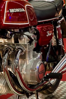 Classic red Honda motorbike with detailed view of the engine, dortmund, germany