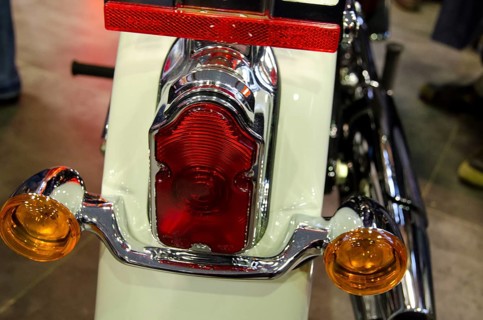 Close-up view of a motorbike tail light with chrome-coloured details and a white housing, dortmund,