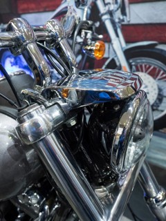 Close-up of the front of a motorbike with shiny chrome details and headlights, dortmund, germany