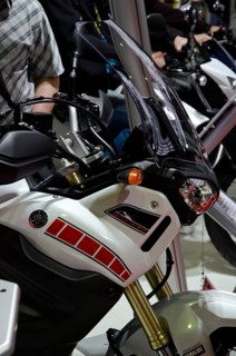 Modern motorbike with sporty design and black windscreen at a trade fair, dortmund, germany