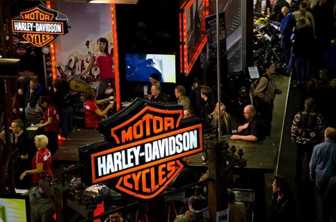 Harley-Davidson trade fair with visitors and prominent signs, dortmund, germany