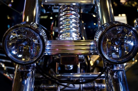Motorbike with shiny double headlights and chrome at night, dortmund, germany
